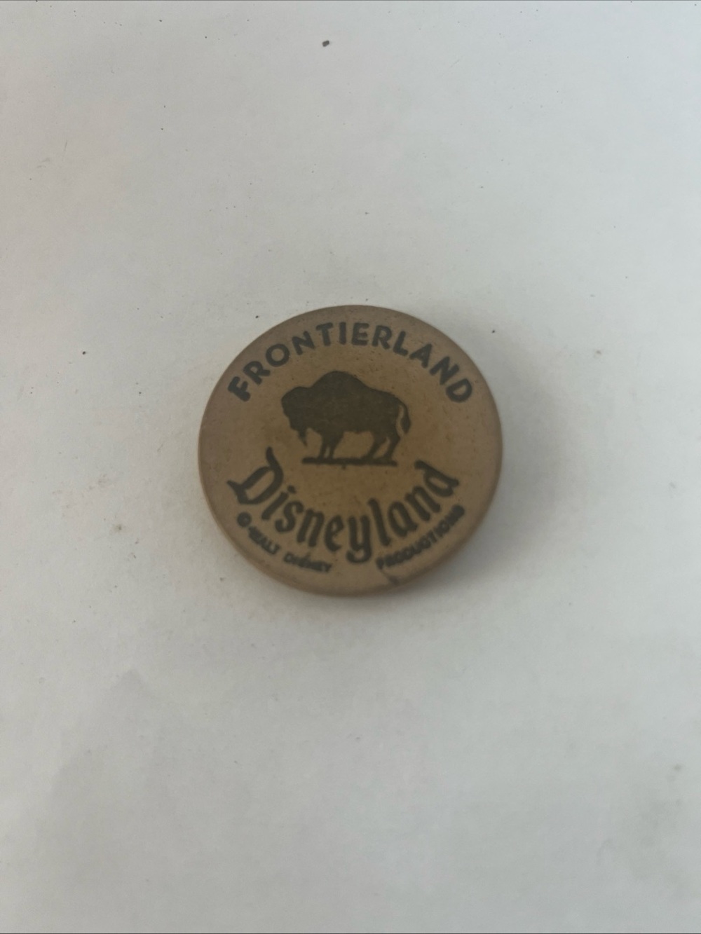 Frontierland Disneyland Buffalo Wooden Nickel — Brown